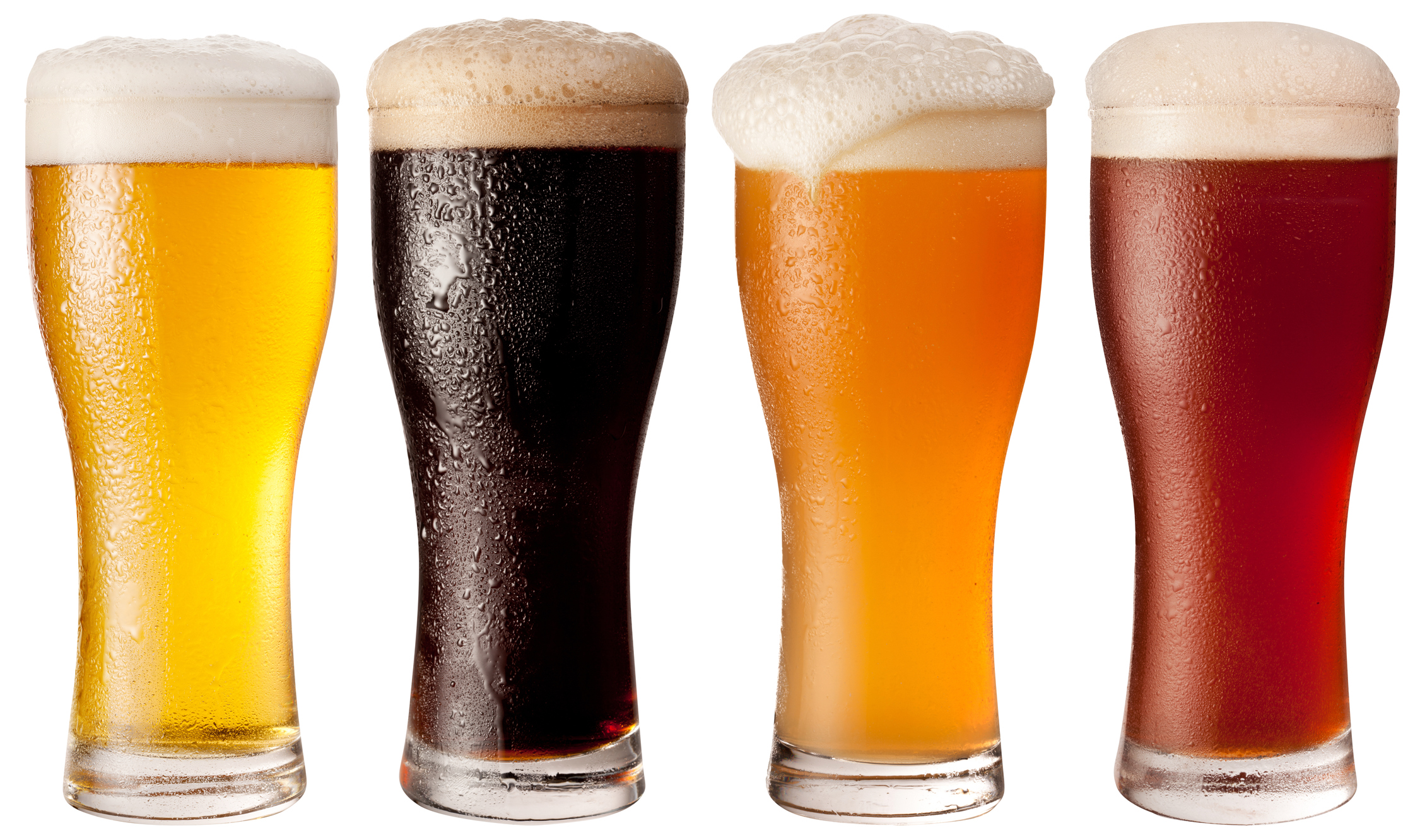 Four glasses with different beers.