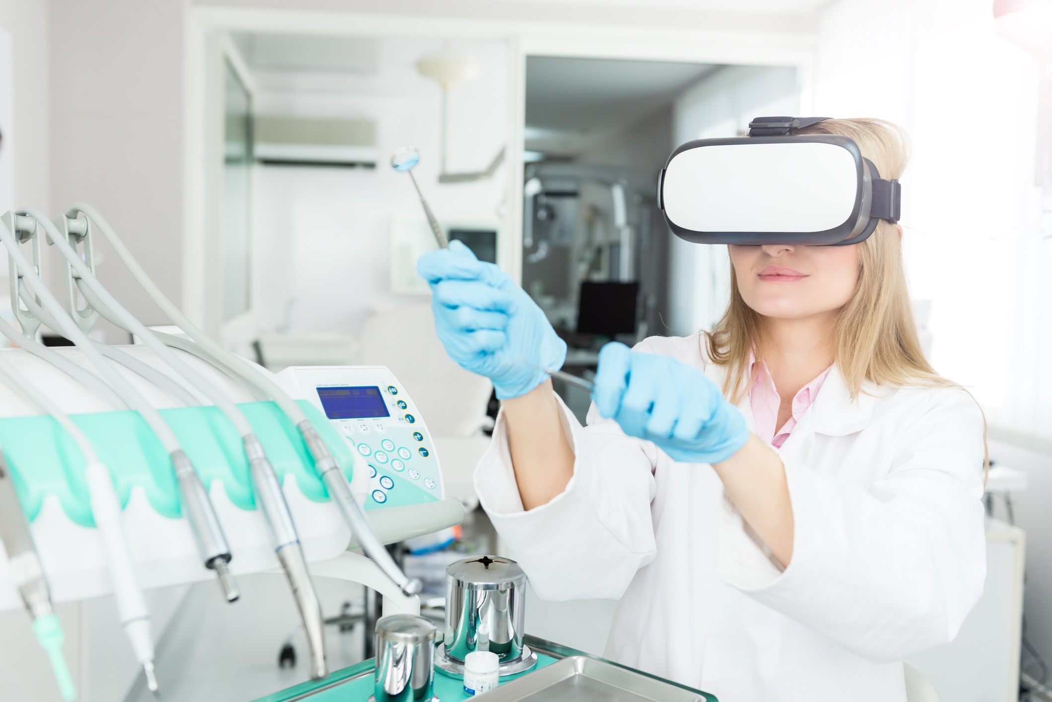 Dentist with Vr headset & dental tools