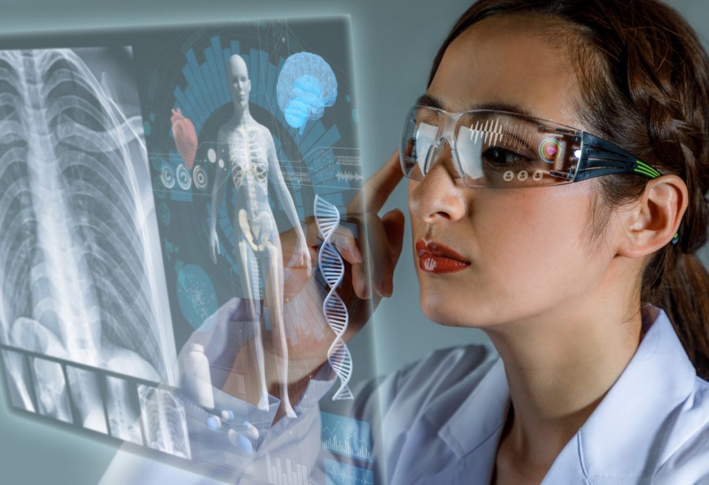 Young female doctor looking at hologram screen. Electronic medical record. Smart glasses. Medical technology concept.